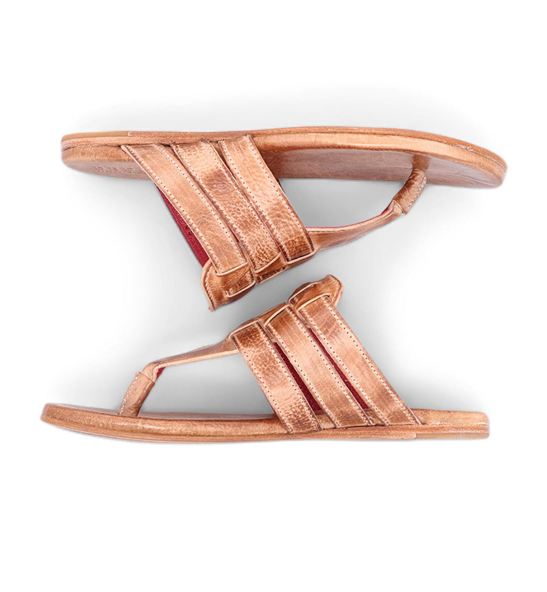 A pair of Yoli tan leather sandals by Bed Stu.