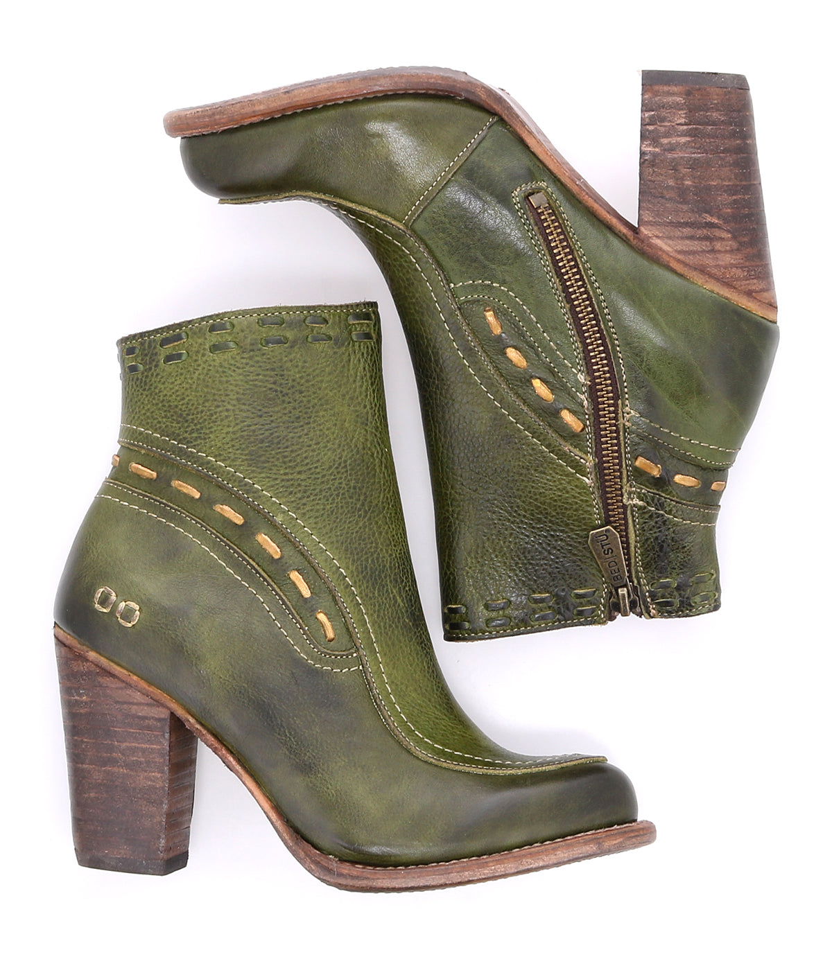 A pair of Yuno green leather ankle boots by Bed Stu.