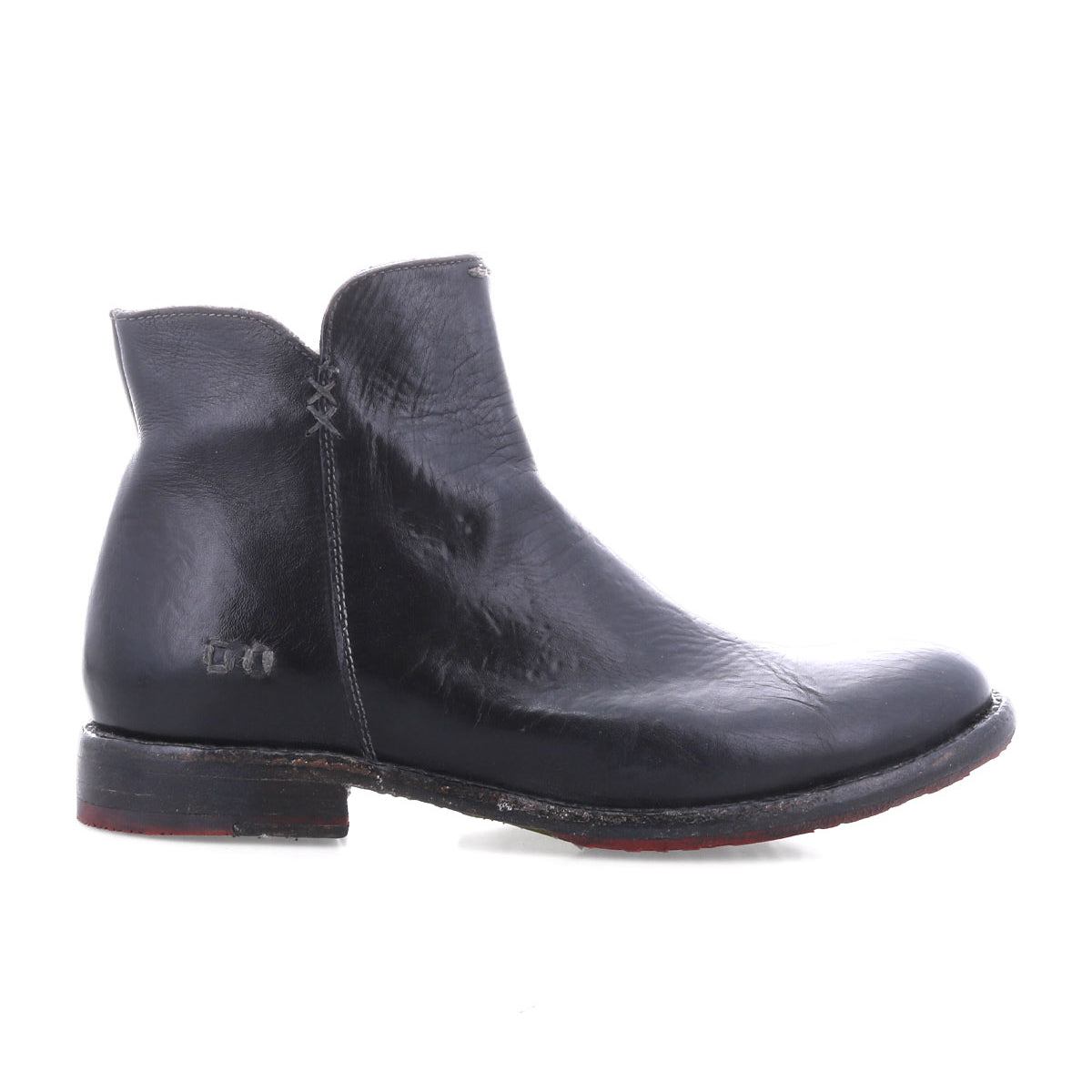 The Bed Stu Yurisa is a black leather ankle boot with visible stitching, a low heel, and red leather lining, shown in a side view on a white background—a stylish everyday choice.