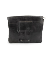 The Ziggy JB by Bed Stu is a black leather crossbody bag featuring a front patch, visible stitching, metal rivets, and a small brand label near the bottom.