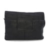 A black leather Ziggy clutch bag on a white background. (Brand: Bed Stu)