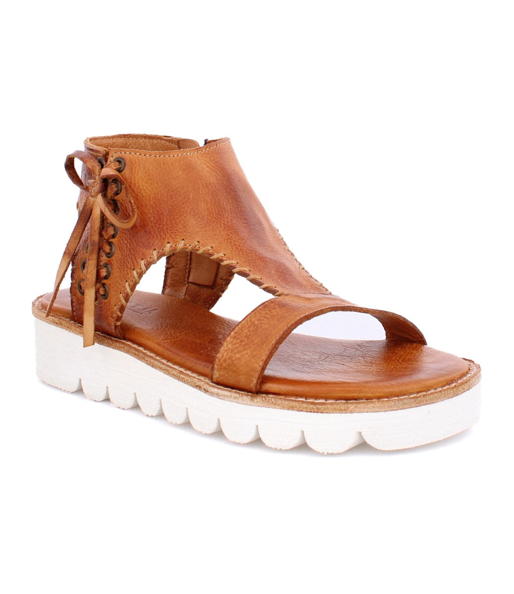 A women's Zoe II tan leather sandal with white soles by Bed Stu.