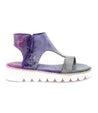 A Bed Stu Zoe II women's purple sandal with a white sole.